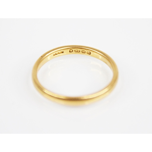 175 - A 22ct yellow gold wedding band, marks for 'ACCo', Birmingham 1931, ring size L, weight 2.7gms