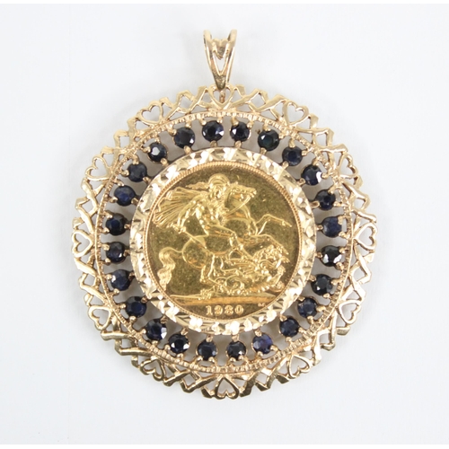 188 - An Elizabeth II sovereign, dated 1980, within a 9ct gold sapphire set pendant mount, the mount set w... 