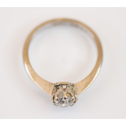 210 - An early 20th century diamond solitaire ring, the central old cut diamond, measuring approximately 5... 