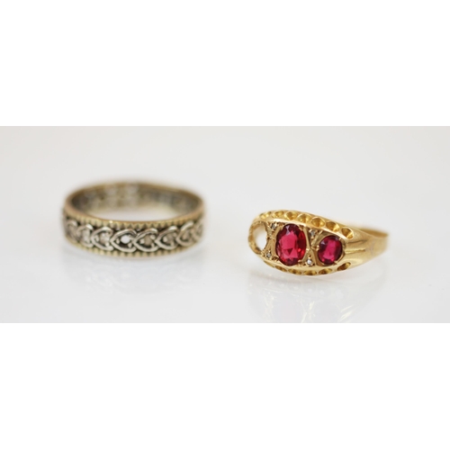 217 - A red spinel and 18ct gold ring, the central oval mixed cut red spinel measuring approximately 5.9 x... 