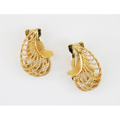 221 - A pair of gold coloured clip-on earrings, of curved pierced form with rope twist detail, clip-on fas... 