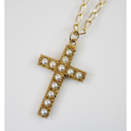 238 - A cultured pearl set gold coloured cross pendant, 30mm x 18mm, upon a 9ct gold curb link chain with ... 