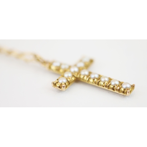 238 - A cultured pearl set gold coloured cross pendant, 30mm x 18mm, upon a 9ct gold curb link chain with ... 