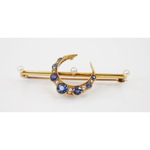 242 - A Victorian sapphire, diamond and pearl crescent brooch, the crescent moon motif set with graduated ... 