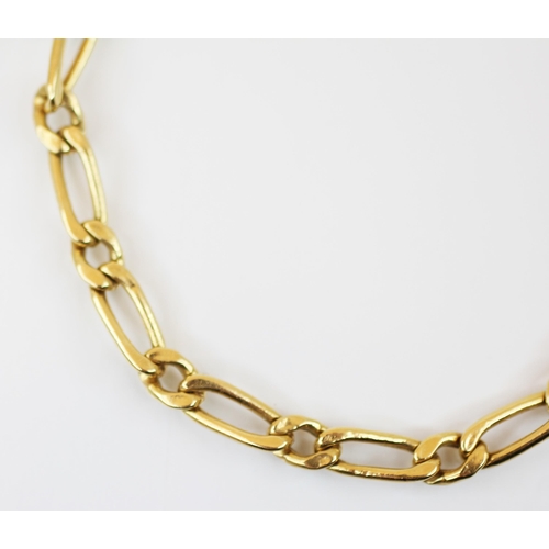 243 - A continental yellow metal figaro link bracelet, with lobster claw and loop fastening and safety cha... 