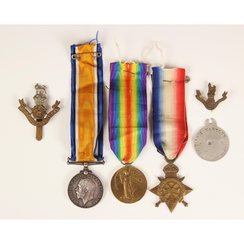 284 - A World War I trio medal group to 2558 Private H Hartley, The Loyal Regiment (North Lancashire), com... 