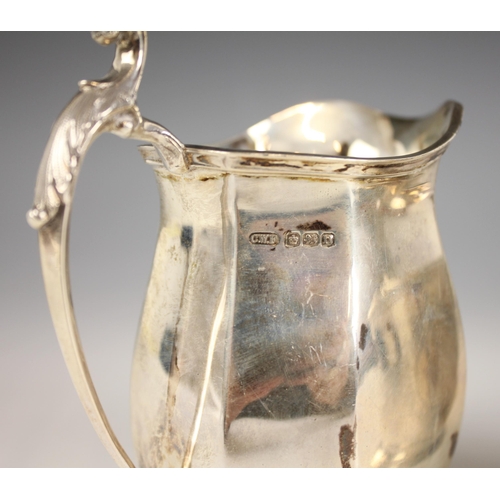 34 - A Victorian silver christening mug, Edward and John Barnard, London 1856, of flared cylindrical form... 