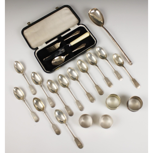 42 - A set of twelve Victorian silver fiddle pattern teaspoons, Goldsmiths' Alliance Ltd, London 1889, of... 