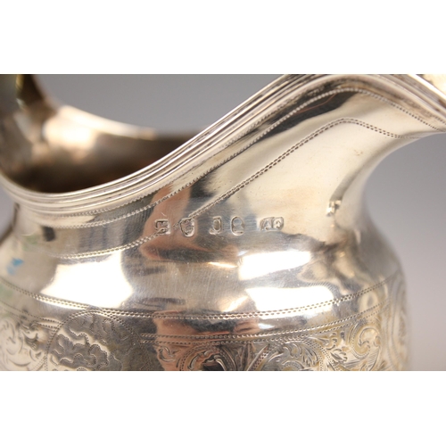 51 - A George III silver cream jug, Alexander Field, London 1789, with angular handle and scrolling folia... 