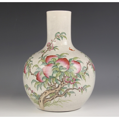 571 - A Chinese porcelain peach bloom vase, 20th century, the tianqiuping shaped globular vase externally ... 