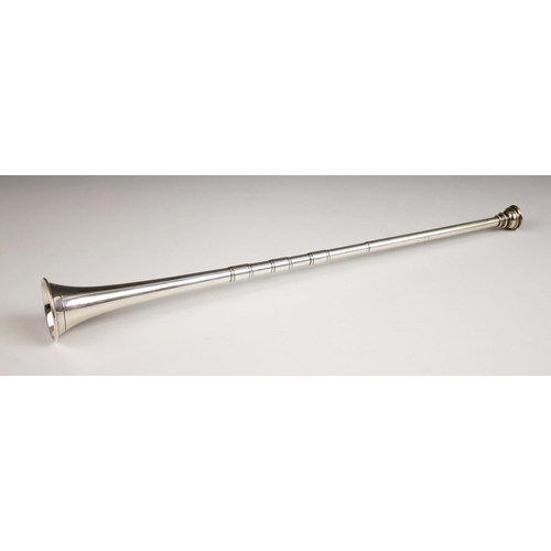59 - An Edwardian silver candle snuffer, possibly Sampson Mordan and Co Ltd, Chester 1908, modelled as a ... 