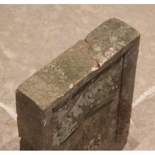 590 - A late 19th century sandstone date block, of rectangular form with raised rim, carved in relief with... 