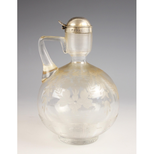 60 - A Victorian silver mounted glass decanter, Horace Woodward and Co, Birmingham 1883, of spherical for... 