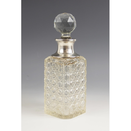 70 - An Edwardian silver collared hobnail glass decanter, S Blanckensee & Son Ltd, Chester 1909, of recta... 