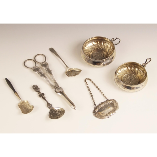 73 - A George III silver caddy spoon, marks for 'TP', London 1794, the shell shaped bowl with embossed fl... 