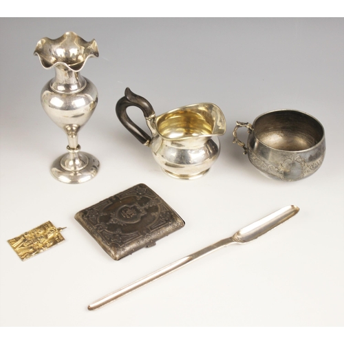 76 - A selection of silver coloured items, to include a vase of baluster form with fluted rim and upon ci... 