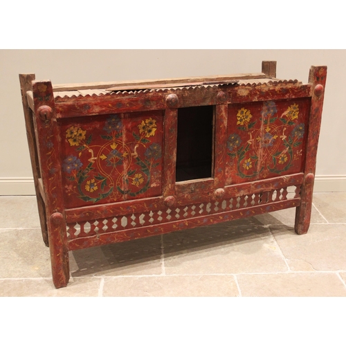 822 - An Eastern European painted pine dowry chest, 19th century, the carved serrated pediment above a cen... 