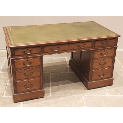 839 - An Edwardian mahogany twin pedestal writing desk, the rectangular moulded top inset with a green lea... 