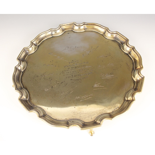 85 - A George VI silver presentation salver, Ernest W Haywood, Birmingham 1947, of circular form with Chi... 