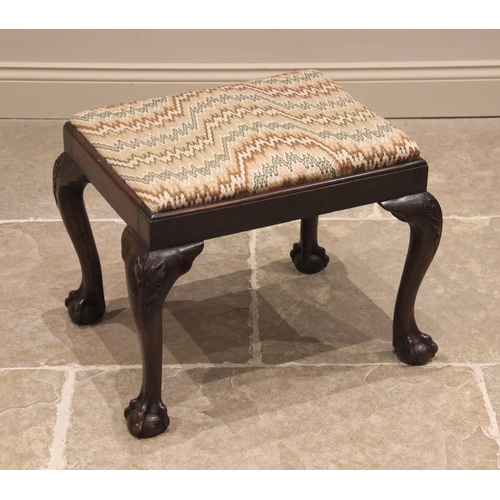 853 - A Chippendale revival mahogany dressing stool, early 20th century, the rectangular upholstered drop-... 