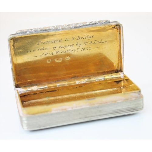 86 - An early Victorian silver snuff box, the rectangular body with hinged cover and engraved anchor and ... 