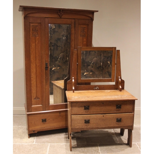 868 - An Arts & Crafts three piece bedroom suite, early 20th century, comprising; a honey oak single wardr... 