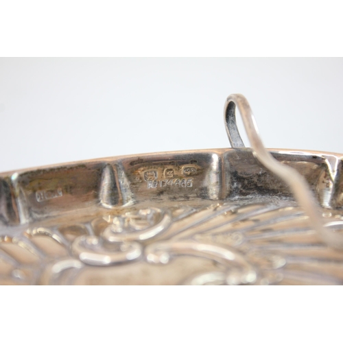 87 - A Victorian silver pen tray, Atkin Brothers, Birmingham 1892, of oval form with embossed decoration ... 