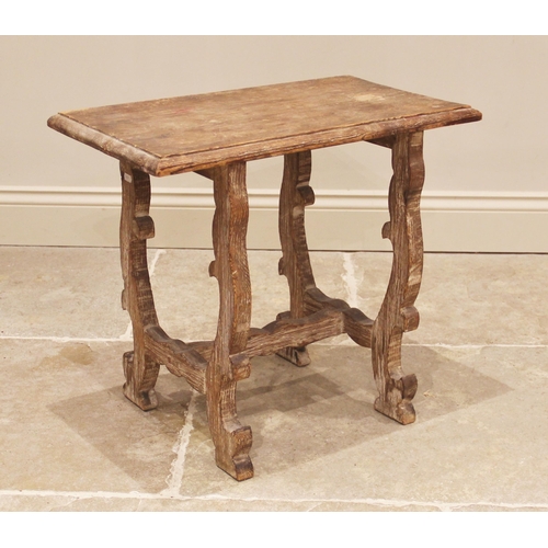 870 - An Arts and Crafts 'Tuscan' style limed pine occasional table, in the manner of Sir Robert Lorimer, ... 