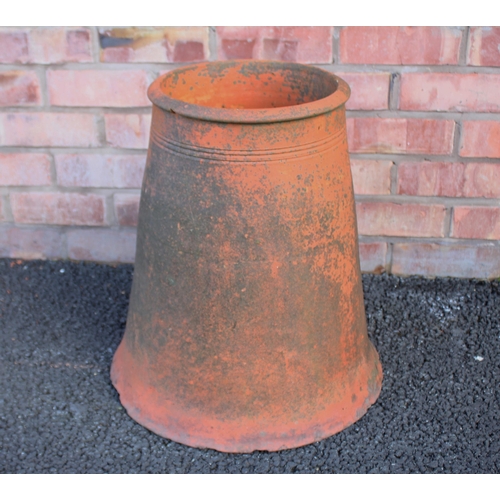 883 - A terracotta rhubarb forcer, of typical bell form, 51cm high