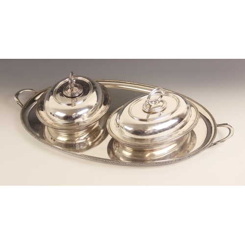 120 - A silver plated egg cruet by Elkington & Co, comprising four egg cups, each with pierced decoration ... 