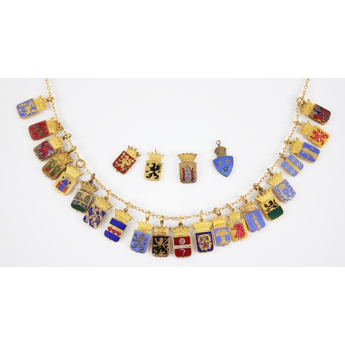 148 - An assortment of enamelled gilt pendants, each designed as coats of arms, modelled as a shield surmo... 