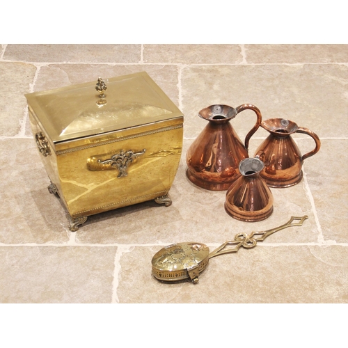 672 - A Victorian brass coal/log bucket of sarcophagus form, the removable cover with a flame finial openi... 