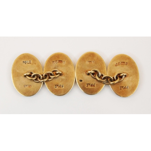 178 - A pair of 9ct gold cufflinks, designed as two oval discs joined by a curb link chain, monogrammed in... 