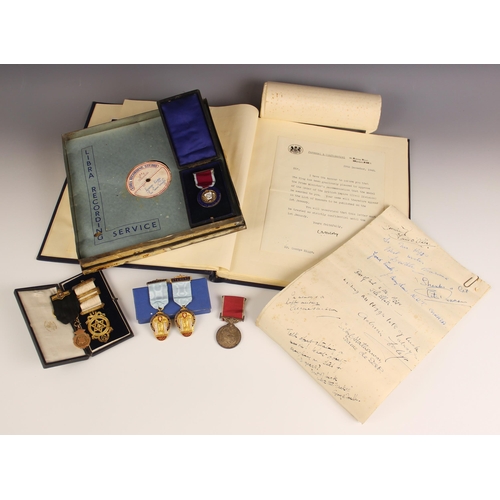 281 - A post-war Civil Division GVIR British Empire Medal to Mr George Higgs, with an album containing the... 