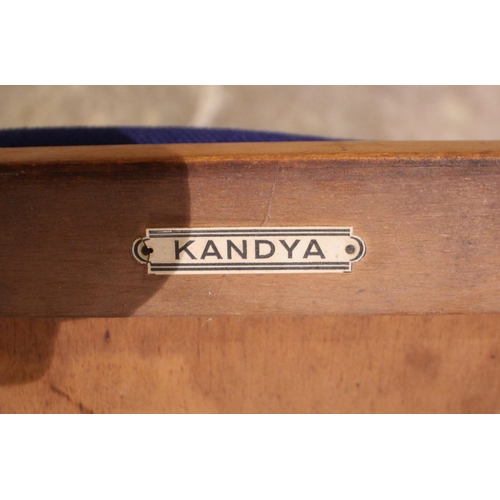 873 - A Danish inspired teak two tier drinks trolley by Kandya, mid 20th century, the two galleried tiers ... 