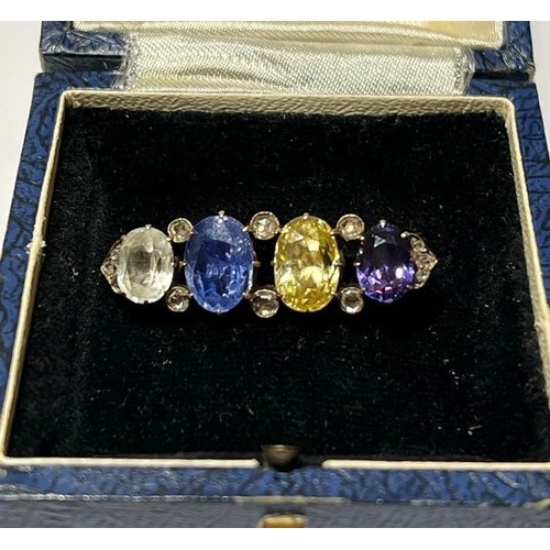 182 - An late 19th/early 20th century sapphire and diamond brooch, comprising a colourless sapphire (7.67 ... 