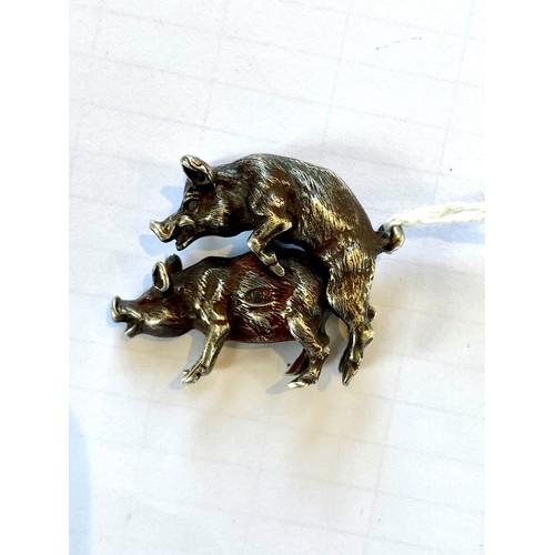 58 - An early 20th century Russian silver model of two mounted pigs, modelled realistically with fur effe... 