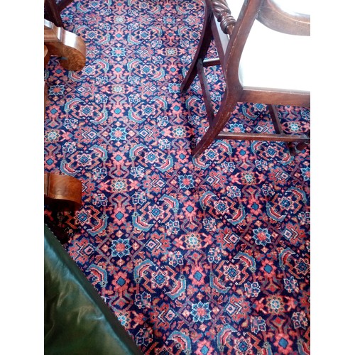 683 - A Persian rich blue ground Sarouk carpet, the multiple repeating gulls upon a blue ground, enclosed ... 