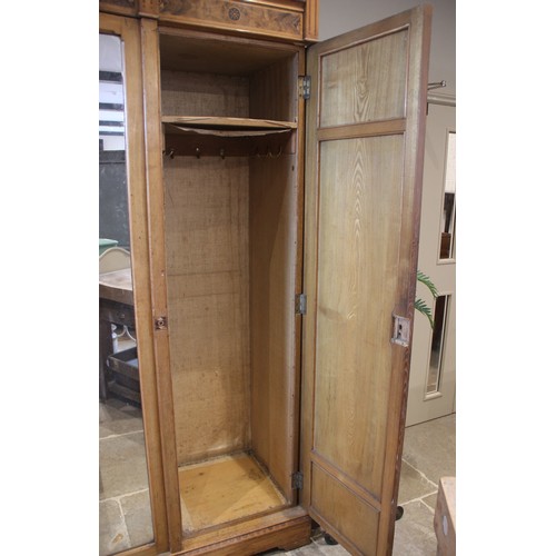 867 - An Arts & Crafts Gothic Revival ash inlaid wardrobe, attributed to Charles Bevan, possibly designed ... 