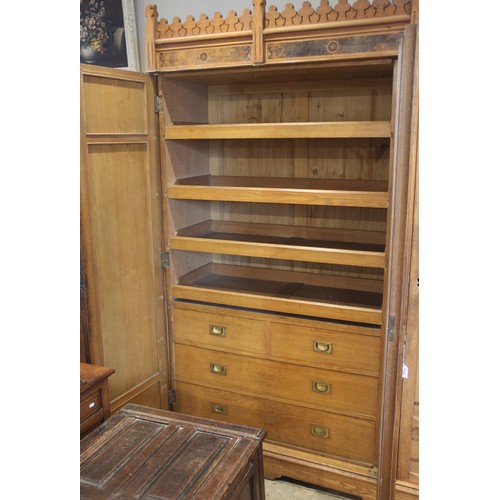 867 - An Arts & Crafts Gothic Revival ash inlaid wardrobe, attributed to Charles Bevan, possibly designed ... 