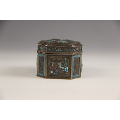 576 - A Chinese silver and enamel box, 19th century, possibly Canton, the canted rectangular box decorated... 