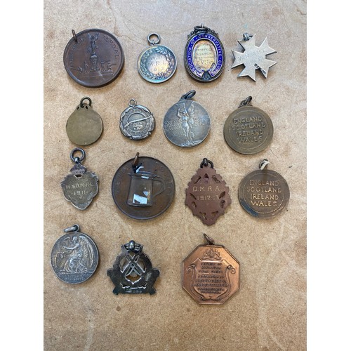 263 - A selection of Ruabon and Wrexham District Rifle Club fobs and medals, to include 'The Bell Medal' -... 