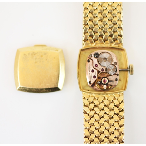 151 - An 18ct gold Omega lady’s wristwatch, the square champagne colour dial with baton markers, set to a ... 