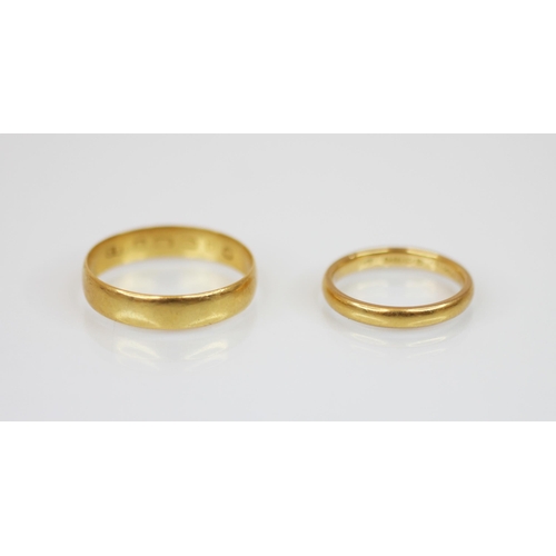 177 - A 22ct gold wedding band, marks for 'SH' Birmingham, date mark indistinct, ring size S 1/2, together... 