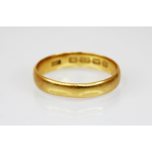 177 - A 22ct gold wedding band, marks for 'SH' Birmingham, date mark indistinct, ring size S 1/2, together... 