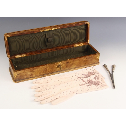 23 - A pair of Edwardian silver glove stretchers, Birmingham 1907, of typical form with cast scroll and c... 