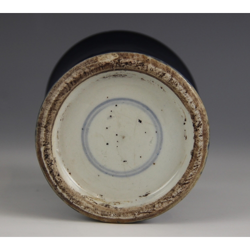 429 - A Chinese porcelain powder blue brush pot (bitong), Kangxi (1661-1722), of tapering cylindrical form... 