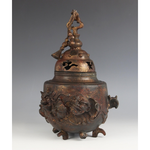 434 - A Chinese parcel gilt and lacquered bronze koro and cover, the cylindrical body applied with theatri... 