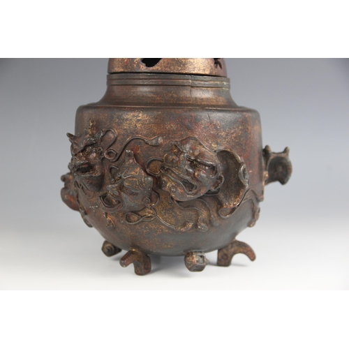 434 - A Chinese parcel gilt and lacquered bronze koro and cover, the cylindrical body applied with theatri... 