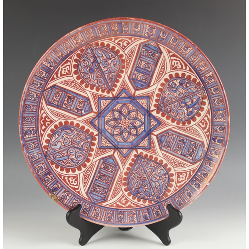 469 - A Cantagalli Hispano Moresque copper lustre charger, 19th century, decorated with Iznik style guls a... 